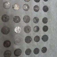 تعدادی سکه شاهی ۲۰ و ۱۰ ریالی