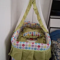 گهواره نوزاد و کریر باهم