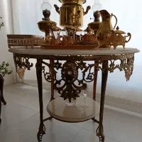 میز برنز وساعت