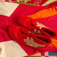 لباس و کفش کشتی‌