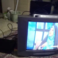 تلویزین، دار قالی و فرش