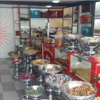 ظروف پایه دار و قفسه مغازه آجیل و خشکبار