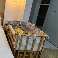 تخت سه منظوره کنار مادر