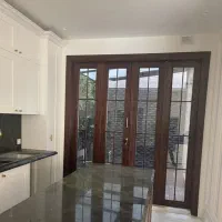 درب ۴ لنگه تمام چوب  همراه با قاب