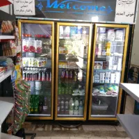 یک عدد یخچال بزرگ 3 درب و یک عدد یخچال تک درب