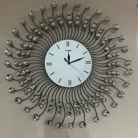 ساعت دیواری طرح  خورشیدی