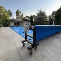 روکش استخر و دستگاه جمع کننده