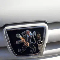 قفل کاپوت نیسان کولردارپراید پژوسمند۲۰۶دنا