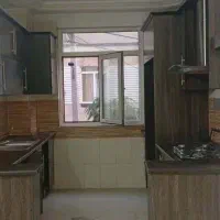 کابینت کار کرده همراه با سینک و هود و گاز رومیزی
