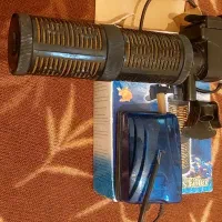 تصفیه اب اکواریوم و پمپ هوا