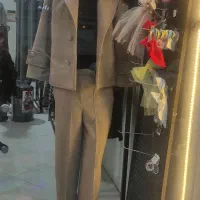 پوشاک بانوان باران