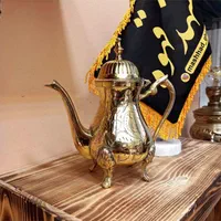 قوری برنجی وارداتی|کلکسیون اشیاء عتیقه|اهواز, زیتون کارگری|دیوار