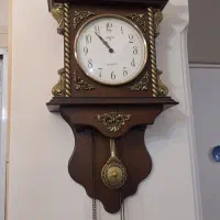 ساعت دیواری چوبی  و برنز شیک