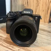 دوربین سونی RVI الفا (آر فور) و لنز ۲۴ سیگما