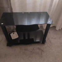 میز زیر تلوزیون شیشه ای  دودی