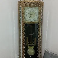 ساعت ایستاده تمام برنز  به همراه یک تلویزیون برنز