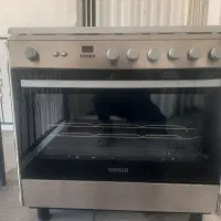 اجاق گاز فر دار تمام استیل اسنوا