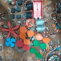 وسایل کاردستی شامل المیچر بدنه گرد و چراغ و کلید