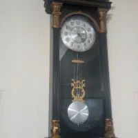 ساعت دیواری آونگ دار