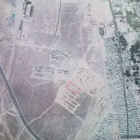 زمین مسکونی پشت پمپ گاز کنارمسکن ملی