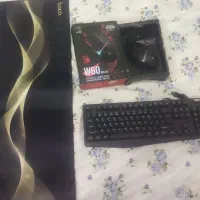 یک عدد موس گیمینگ با کیبورد و پت موس