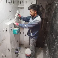 کاشی کار کاشیکاری سرامیک کار.بنا ایزگامکار