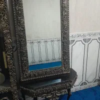 اینه وکنسول،ساعت