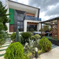 دوبلکس با جکوزی و حیاط سرسبز/18ماهه