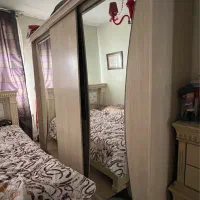 کمد سه درب ریلی و دارای قسمتهای مجزا