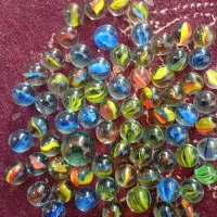 تیله  یکی بزرگ و ۷۰تا کوچیک