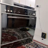 اجاق گاز 5 شعله و فرش 12 متری سالم