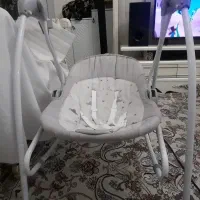 گهواره یامریکایی موزیکال باتری خور جای شارژم داره