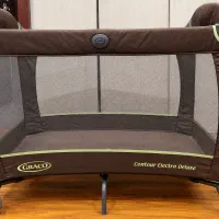 تخت و پارک بازی کودک برند  Graco