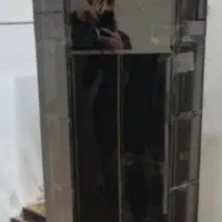 ساعت ایستاده اینه ایی نقره ایی