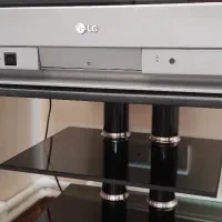 تلویزیون LG ۲۴ اینچ همراه با میز|تلویزیون و پروژکتور|تهران, جنت‌آباد مرکزی|دیوار