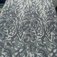 یک قواره پارچه تور رنگ طوسی