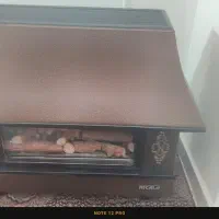 بخاری شومینه ای در حد اکبند