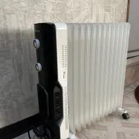 شوفاژ برقی ۱۳ پره آواکس بخاری برقی