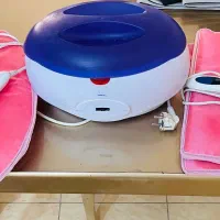 دستگاه  پارافین همراه با پاپوش و دست پوش برقی