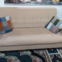 مبل راحتی و ساعت استاده