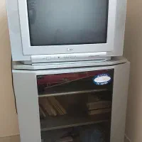 تلویزیون  LG همراه میز ست آن