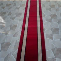 کنار فرش و چند تکه موکت