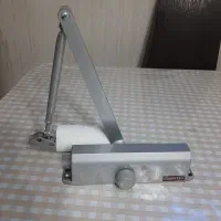 جک آرام بند درب حیاطی در حد نو
