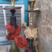 دوتا قلیون یکی چوبی رخ پیرمرد یکی هم برنجه