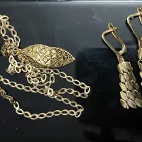 طلا النگو گوشواره دستبند گردنبنددو درصد روی تابلو