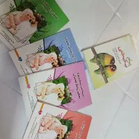 تعدادی کتاب کوچیک باهم ۱۰۰