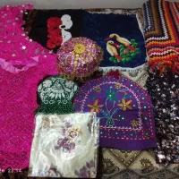 مقداری پارچه مخمل گلدوزی شده منجوق