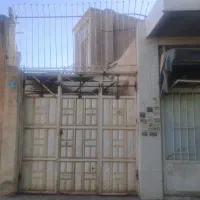 یک عدد درب حیاط سه لنگه و یک درب مغازه سنگین