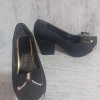 کفش مجلسی|کیف، کفش، کمربند|رشت, باهنر|دیوار