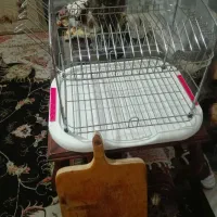 آب چکان روی کابینت وتخته گوشت